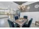 Tastefully designed dining room with a view of the kitchen, perfect for entertaining guests at 10446 Highland Park Pl, Palmetto, FL 34221