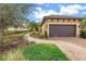 Charming single-Gathering home featuring a well-manicured lawn and a private two-car garage at 10446 Highland Park Pl, Palmetto, FL 34221
