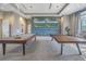 Recreational game room featuring a pool table, ping pong table, and flat screen TVs at 10446 Highland Park Pl, Palmetto, FL 34221