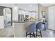 Well-lit kitchen with stainless steel appliances and granite countertops at 10446 Highland Park Pl, Palmetto, FL 34221