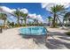 Sparkling blue swimming pool features a refreshing and relaxing swimming experience at 10446 Highland Park Pl, Palmetto, FL 34221