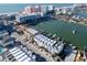 Wonderful view of coastal properties, docks, sailboats, and clear blue water at 130 Brightwater Dr # 5, Clearwater Beach, FL 33767