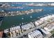 Beautiful aerial view of townhomes with boat docks and access to the bay at 130 Brightwater Dr # 5, Clearwater Beach, FL 33767