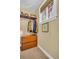 Secondary closet with built-in storage shelves and hanging space at 130 Brightwater Dr # 5, Clearwater Beach, FL 33767