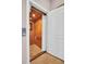 Private elevator with wood paneling, creating an accessible and elegant feature within the home at 130 Brightwater Dr # 5, Clearwater Beach, FL 33767
