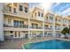 Beautiful waterfront property with swimming pool and multi-level balconies at 130 Brightwater Dr # 5, Clearwater Beach, FL 33767
