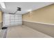 Clean, empty garage with white walls and sealed floors ready for storage or parking at 130 Brightwater Dr # 5, Clearwater Beach, FL 33767