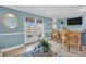 Inviting living area with outdoor access, bar seating, and relaxing waterfront views at 130 Brightwater Dr # 5, Clearwater Beach, FL 33767