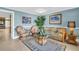 Relaxing living room with tropical decor, comfortable seating, and a beachy atmosphere at 130 Brightwater Dr # 5, Clearwater Beach, FL 33767