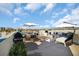 Relaxing rooftop deck with a dining area, grill, comfortable seating, and panoramic cityscape views at 130 Brightwater Dr # 5, Clearwater Beach, FL 33767