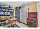 Organized storage room equipped with shelving, lockers, and tool chests for ample storage solutions at 130 Brightwater Dr # 5, Clearwater Beach, FL 33767