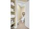 Toilet room with a toilet, shelving, and towel storage at 130 Brightwater Dr # 5, Clearwater Beach, FL 33767