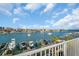 Stunning water view from this residence, showcasing a marina with boats and a vibrant skyline at 130 Brightwater Dr # 5, Clearwater Beach, FL 33767