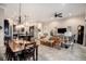 Open floor plan featuring a dining room, living room, and kitchen at 13305 Fawn Lily Dr, Riverview, FL 33579