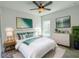 Calming bedroom featuring decor, natural light, and a ceiling fan at 134 Jade St, Rotonda West, FL 33947