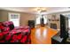 Spacious bedroom with hardwood floors and an attractive fireplace and mantel display at 215 Willowick Ave, Temple Terrace, FL 33617