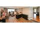 Spacious home office with built-in bookshelves, a desk, and exercise equipment at 215 Willowick Ave, Temple Terrace, FL 33617