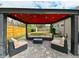 Outdoor entertaining area with a spacious seating area covered by a pergola at 215 Willowick Ave, Temple Terrace, FL 33617