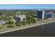 A lovely aerial view of the community, nearby buildings, and the water at 2405 S Ardson Pl # 303A, Tampa, FL 33629