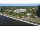 Enjoy an aerial view of this condominium complex near the water at 2405 S Ardson Pl # 303A, Tampa, FL 33629