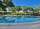 Relax in the sun by the beautiful pool with lounge chairs at 2405 S Ardson Pl # 303A, Tampa, FL 33629