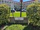 Well-maintained Rila Renaissance building entrance featuring mature landscaping at 2431 Franciscan Dr # 45, Clearwater, FL 33763