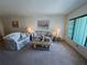 Charming living room with lots of light and views at 2431 Franciscan Dr # 45, Clearwater, FL 33763