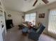 Serene living area featuring comfortable seating and natural light at 2431 Franciscan Dr # 45, Clearwater, FL 33763