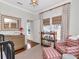 Charming bedroom with views, featuring natural light and stylish furnishings, creating a cozy atmosphere at 2514 W Morrison Ave, Tampa, FL 33629