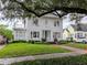 Charming home with a large front yard, manicured lawn, and inviting front porch at 2514 W Morrison Ave, Tampa, FL 33629