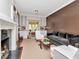 Sophisticated living room with fireplace, built-in cabinets, and comfortable seating at 2514 W Morrison Ave, Tampa, FL 33629