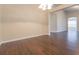Spacious dining room with hardwood floors, recessed lighting, and neutral paint at 29636 Tee Shot Dr, San Antonio, FL 33576