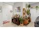 Inviting foyer with tile flooring, decorative console table, staircase, and ample natural light at 30045 Southwell Ln, Wesley Chapel, FL 33543
