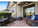 Relaxing screened patio with brick flooring, ample seating, overlooking a green lawn at 30045 Southwell Ln, Wesley Chapel, FL 33543