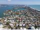 Wide aerial shot of a coastal neighborhood highlighting the home's location at 305 160Th Ter, Redington Beach, FL 33708