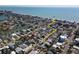 Scenic aerial view highlighting the home's short proximity and easy access to the stunning beach at 305 160Th Ter, Redington Beach, FL 33708