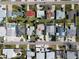 Aerial view of a neighborhood with the home marked by a red pin at 305 160Th Ter, Redington Beach, FL 33708