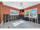 Cozy bedroom featuring multiple windows providing abundant natural light and views at 305 160Th Ter, Redington Beach, FL 33708
