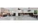 Spacious living room with ample natural light from windows, and an open layout at 305 160Th Ter, Redington Beach, FL 33708