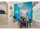 Bright breakfast nook featuring lots of natural light and modern light fixture at 31836 Stillmeadow Dr, Wesley Chapel, FL 33543