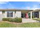 Charming patio with outdoor seating and a lush green lawn, perfect for entertaining at 31836 Stillmeadow Dr, Wesley Chapel, FL 33543