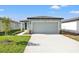 Charming single-Gathering home boasts a two-car garage and well-maintained landscaping at 3637 Moscato Dr, Brooksville, FL 34602