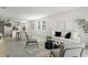 Bright and airy open-concept living area with modern decor, and tile flooring at 3637 Moscato Dr, Brooksville, FL 34602
