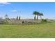 Benton Hills community sign surrounded by a lush green lawn and picturesque landscaping at 3637 Moscato Dr, Brooksville, FL 34602
