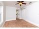 This bedroom features a ceiling fan and view to another room at 4162 3Rd N Ave, St Petersburg, FL 33713