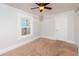 This bedroom features a ceiling fan and window at 4162 3Rd N Ave, St Petersburg, FL 33713