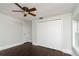 This bedroom features a ceiling fan and closet at 4162 3Rd N Ave, St Petersburg, FL 33713