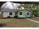 Charming one-story home with a well-maintained front yard and inviting green front door at 4162 3Rd N Ave, St Petersburg, FL 33713