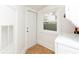 Bright laundry room with neutral tile, natural light and rear access to the backyard at 4162 3Rd N Ave, St Petersburg, FL 33713
