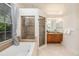 Bathroom features separate tub and shower and lots of natural light at 4324 Auston Way, Palm Harbor, FL 34685
